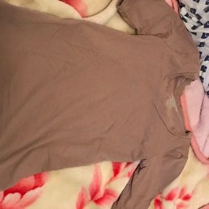 Simple plain tan shirt.